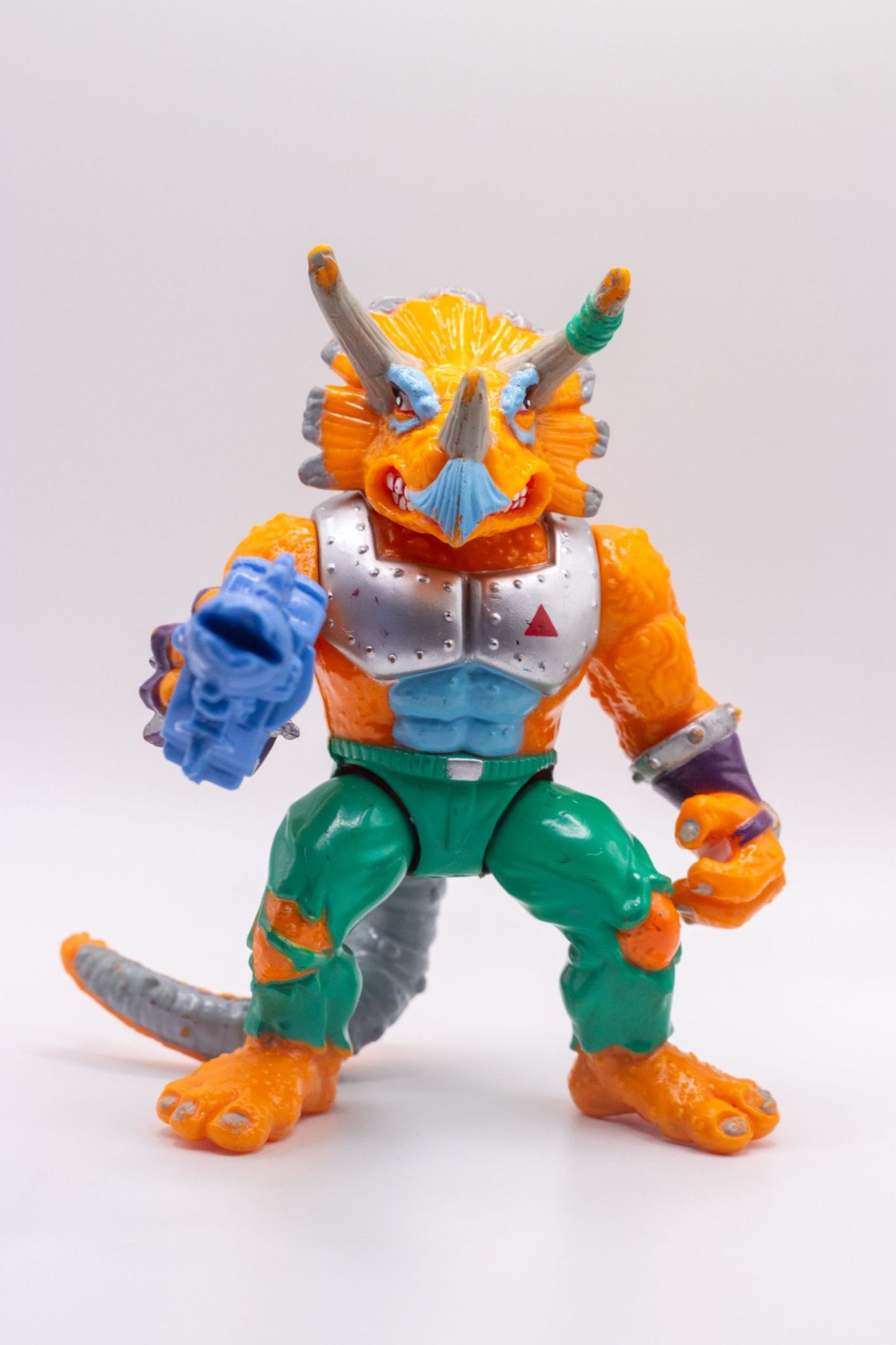 Front angle shot of Triceraton action figure with Laser Phaser pointed forward