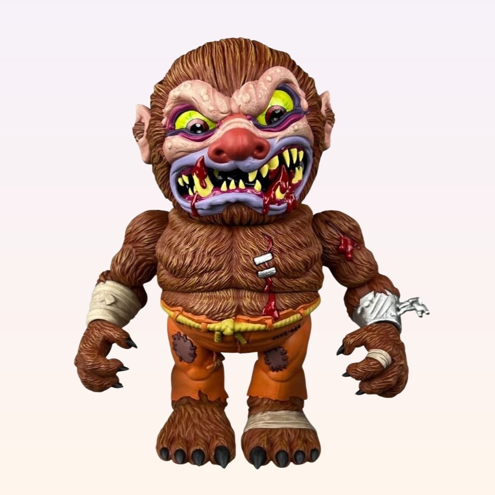Front shot of Wolf Breath Madballs action figure with blood-streaked fangs and orange patched trousers