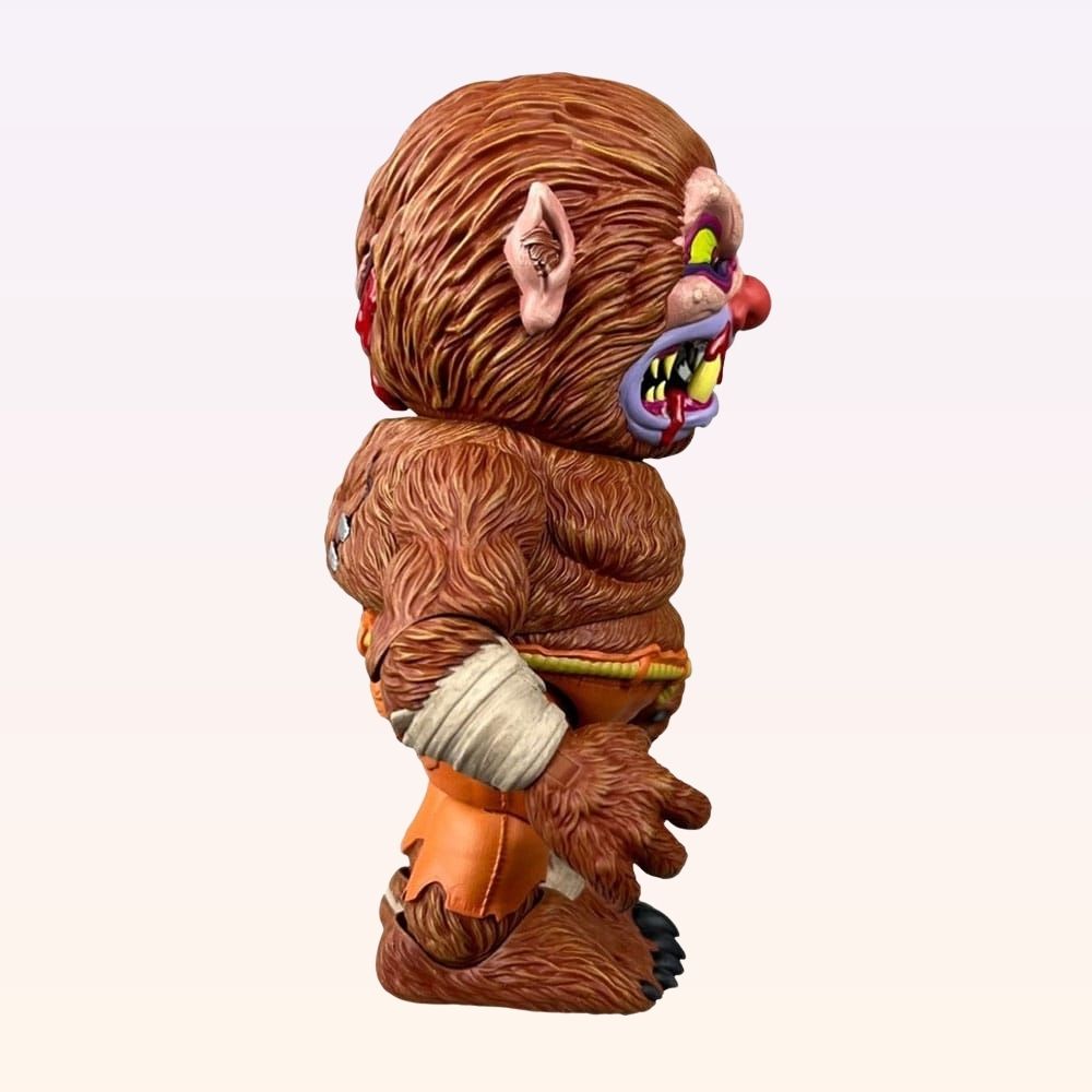 Right side shot of Wolf Breath Madballs action figure showing snarling mouth and orange patched trousers