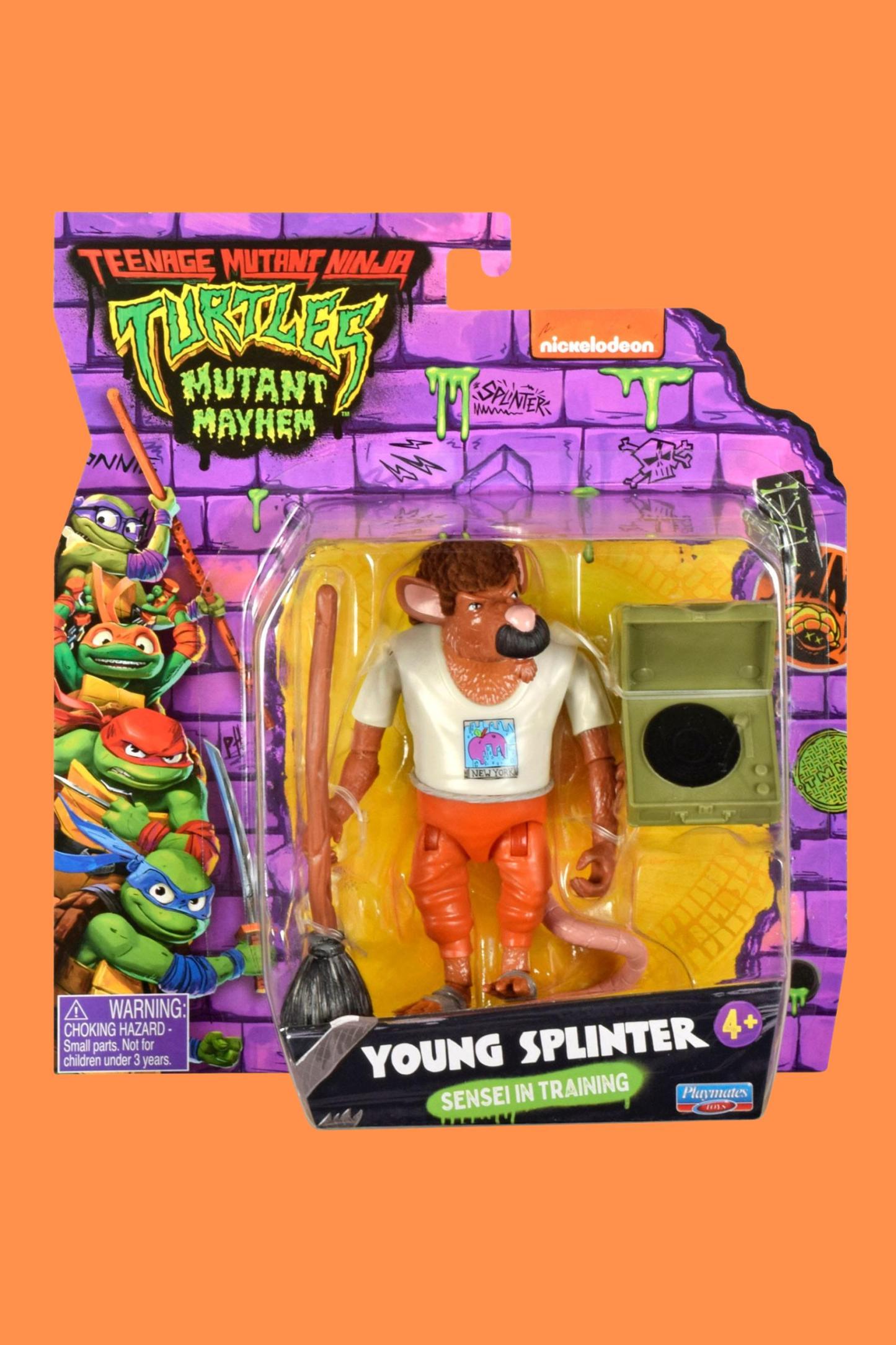 Front-facing shot of Young Splinter Mutant Mayhem action figure sealed on card with broom and record player accessories