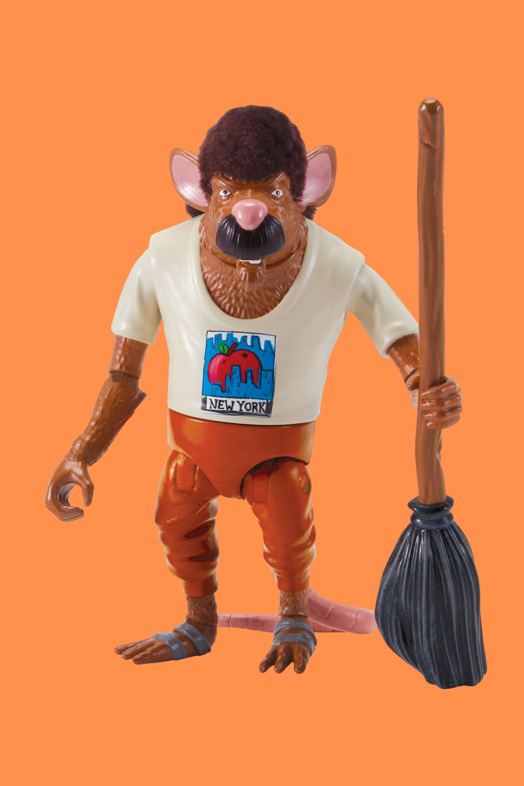 Front-facing shot of Young Splinter Mutant Mayhem action figure holding broom accessory with flocked hair