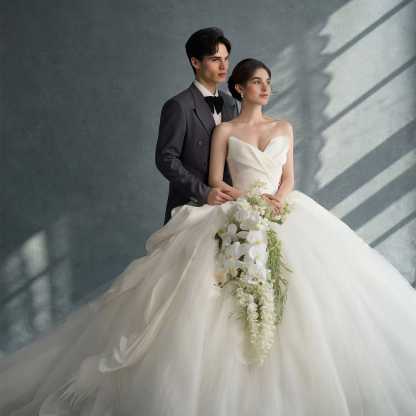 Elegant Cascading Bridal Bouquet with White Orchids and Greenery - High-Quality Artificial Flowers for Weddings and Special Occasions, Sophisticated Design and Lasting Beauty