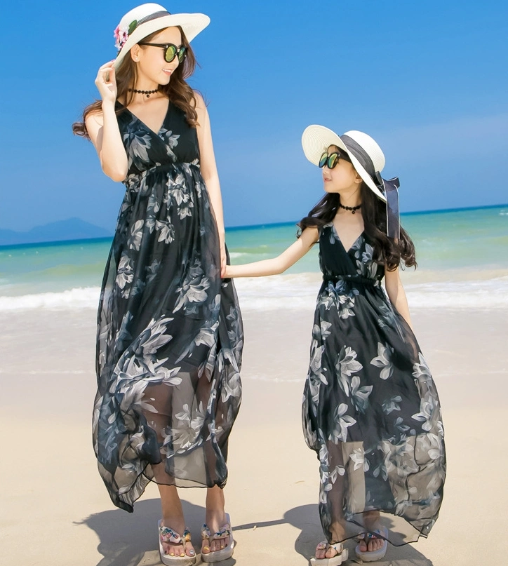 Little Maven Mom and daughter in black floral dresses
