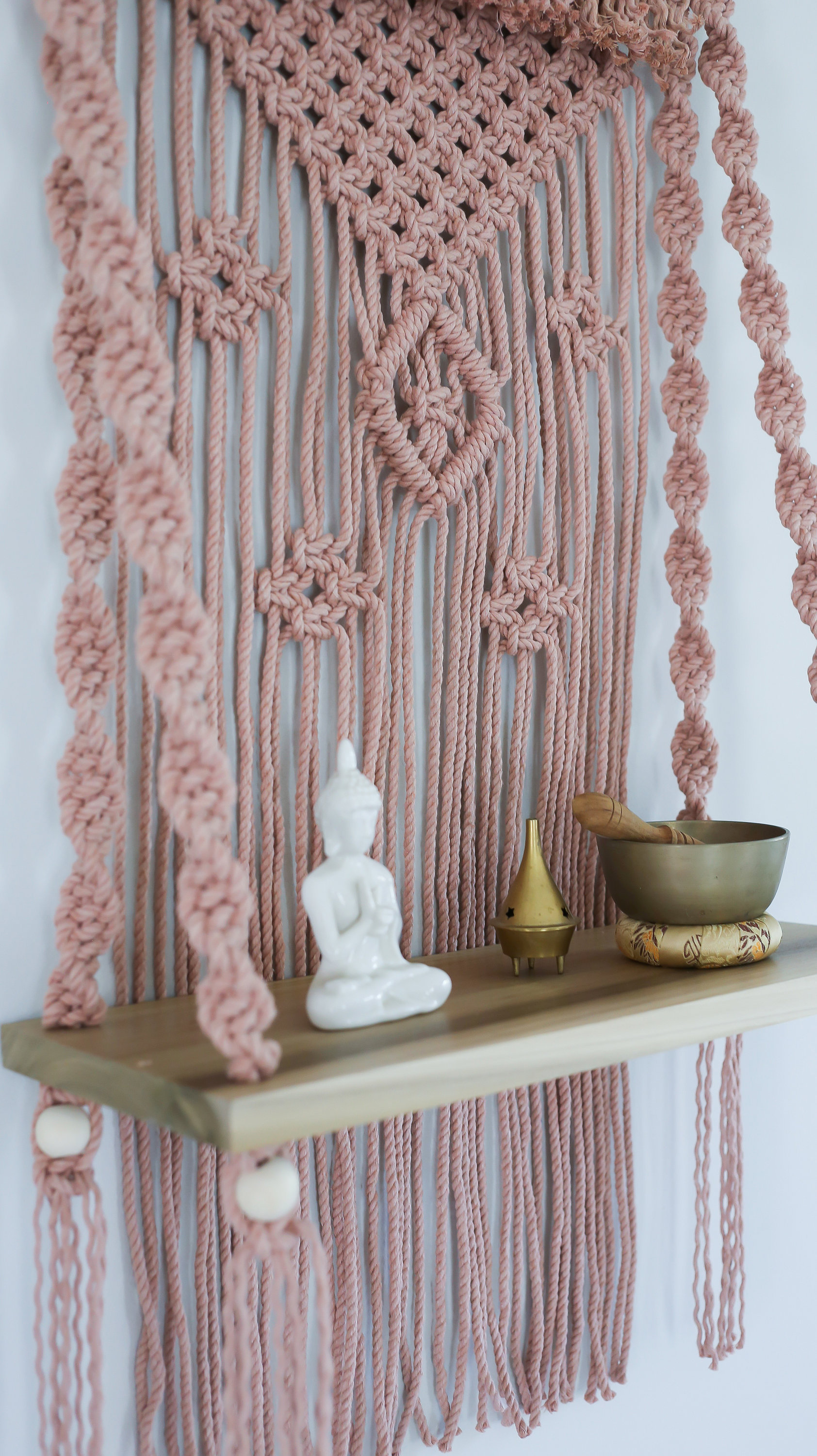 Materials: cotton cord, wood dowel, polar wood shelf, wood beads  Width: 22 inches Height: 36 inches Depth: 8 inches Gift wrapping available About this item Handcrafted decorative wall hanging with 18" poplar wood shelf. This hanging side table is eye cat