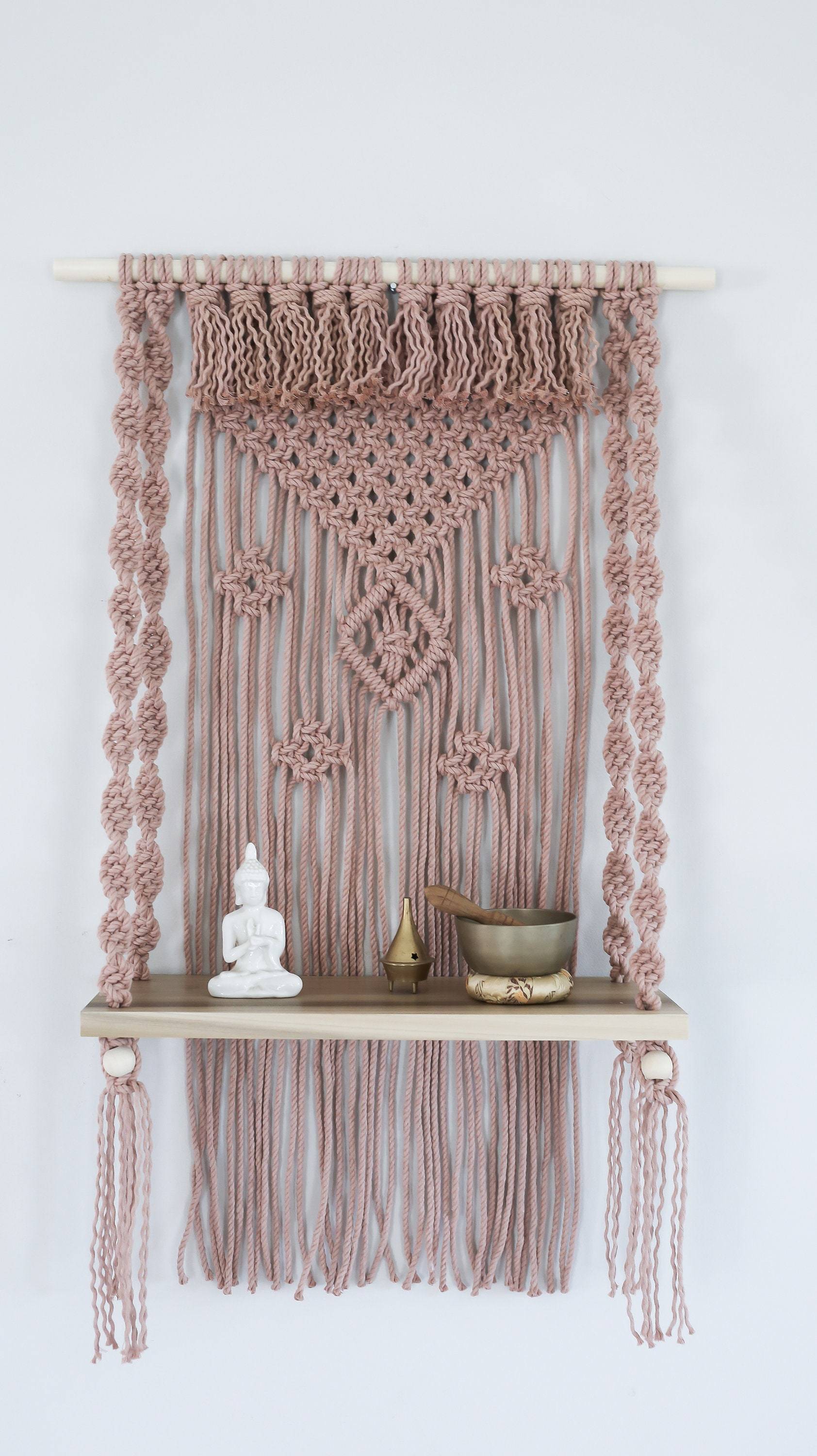 Materials: cotton cord, wood dowel, polar wood shelf, wood beads  Width: 22 inches Height: 36 inches Depth: 8 inches Gift wrapping available About this item Handcrafted decorative wall hanging with 18" poplar wood shelf. This hanging side table is eye cat