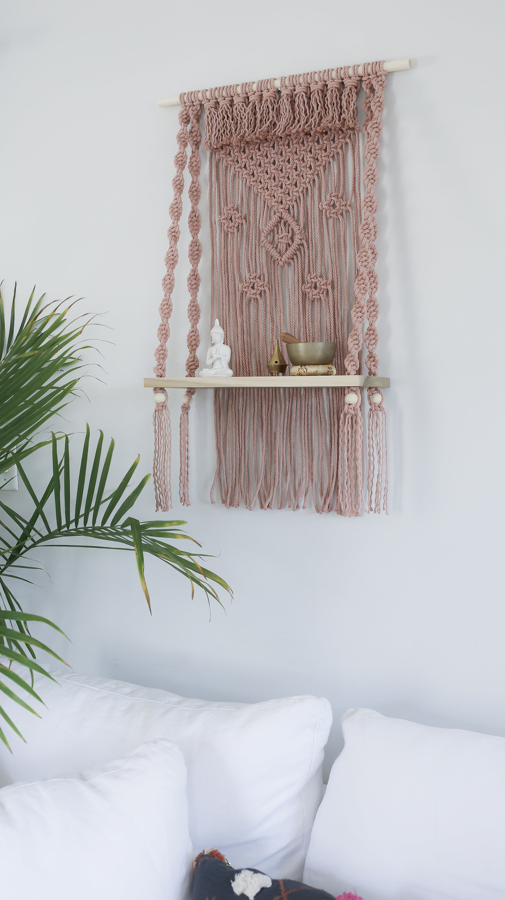 Materials: cotton cord, wood dowel, polar wood shelf, wood beads  Width: 22 inches Height: 36 inches Depth: 8 inches Gift wrapping available About this item Handcrafted decorative wall hanging with 18" poplar wood shelf. This hanging side table is eye cat