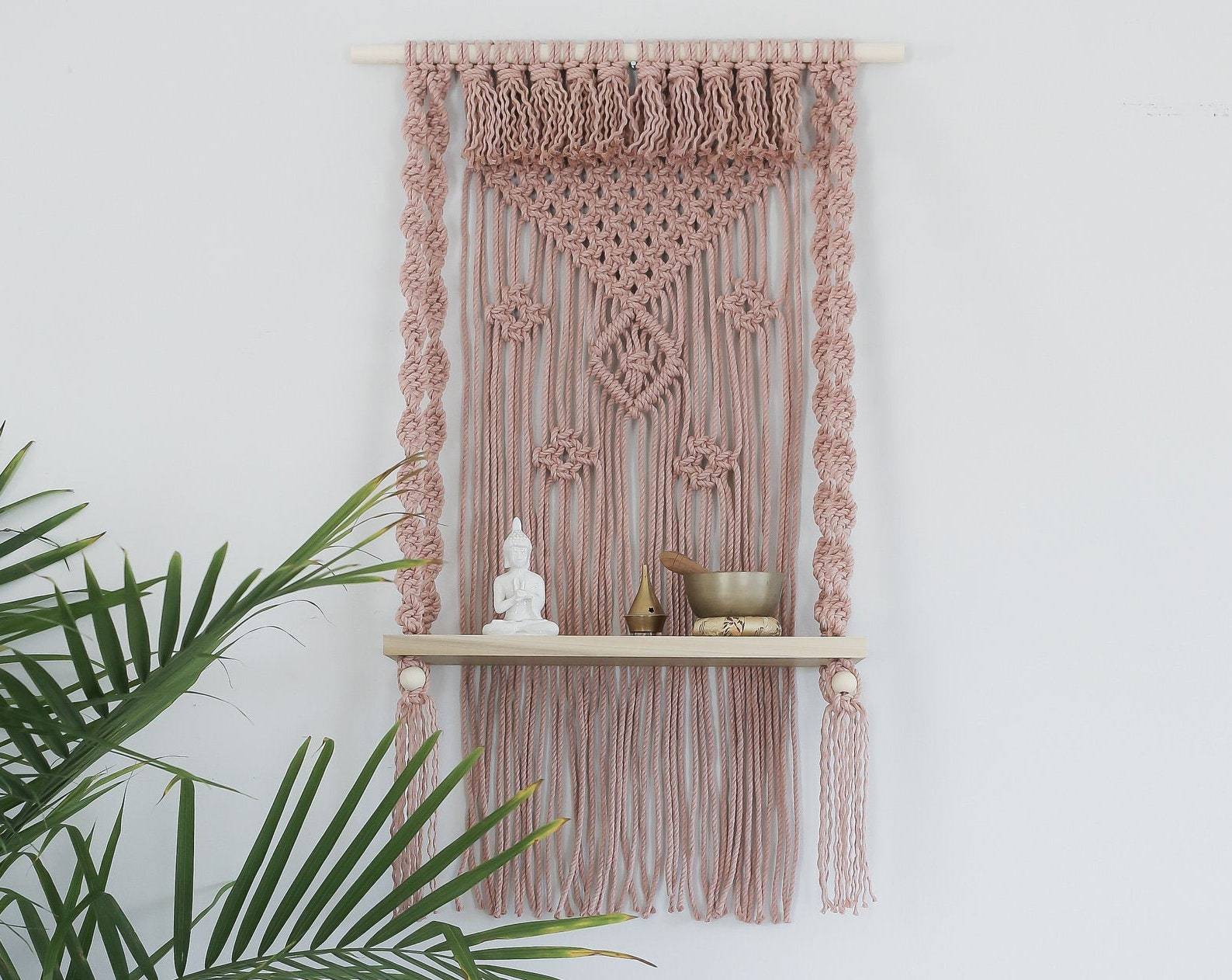 Materials: cotton cord, wood dowel, polar wood shelf, wood beads  Width: 22 inches Height: 36 inches Depth: 8 inches Gift wrapping available About this item Handcrafted decorative wall hanging with 18" poplar wood shelf. This hanging side table is eye cat