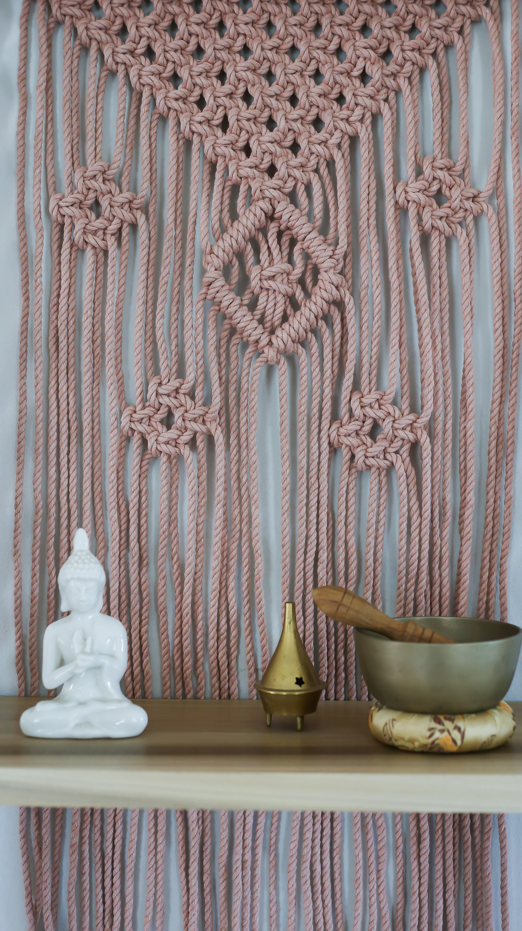 Materials: cotton cord, wood dowel, polar wood shelf, wood beads  Width: 22 inches Height: 36 inches Depth: 8 inches Gift wrapping available About this item Handcrafted decorative wall hanging with 18" poplar wood shelf. This hanging side table is eye cat