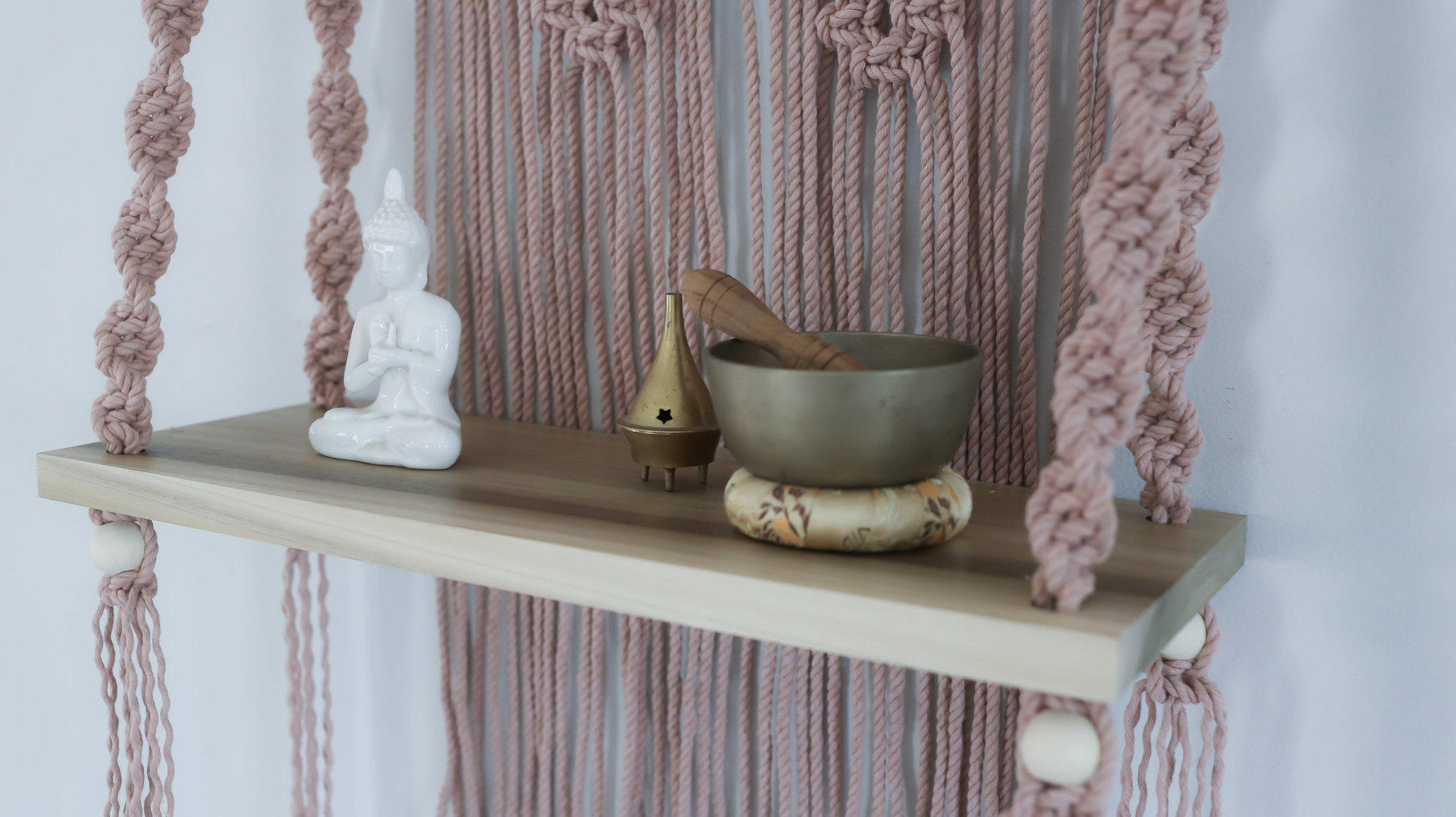 Materials: cotton cord, wood dowel, polar wood shelf, wood beads  Width: 22 inches Height: 36 inches Depth: 8 inches Gift wrapping available About this item Handcrafted decorative wall hanging with 18" poplar wood shelf. This hanging side table is eye cat