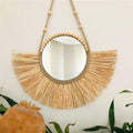 Wall hangs Round wall mirrors framed with boho