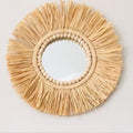 Wall hangs Round wall mirrors framed with boho
