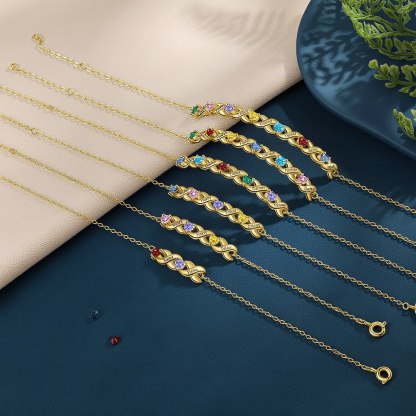 Personalisiertes Herzarmband mit 2-7 Namen & Geburtssteinen