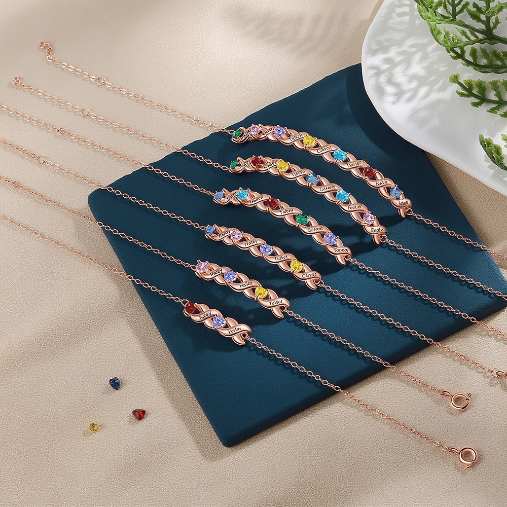 Personalisiertes Herzarmband mit 2-7 Namen & Geburtssteinen