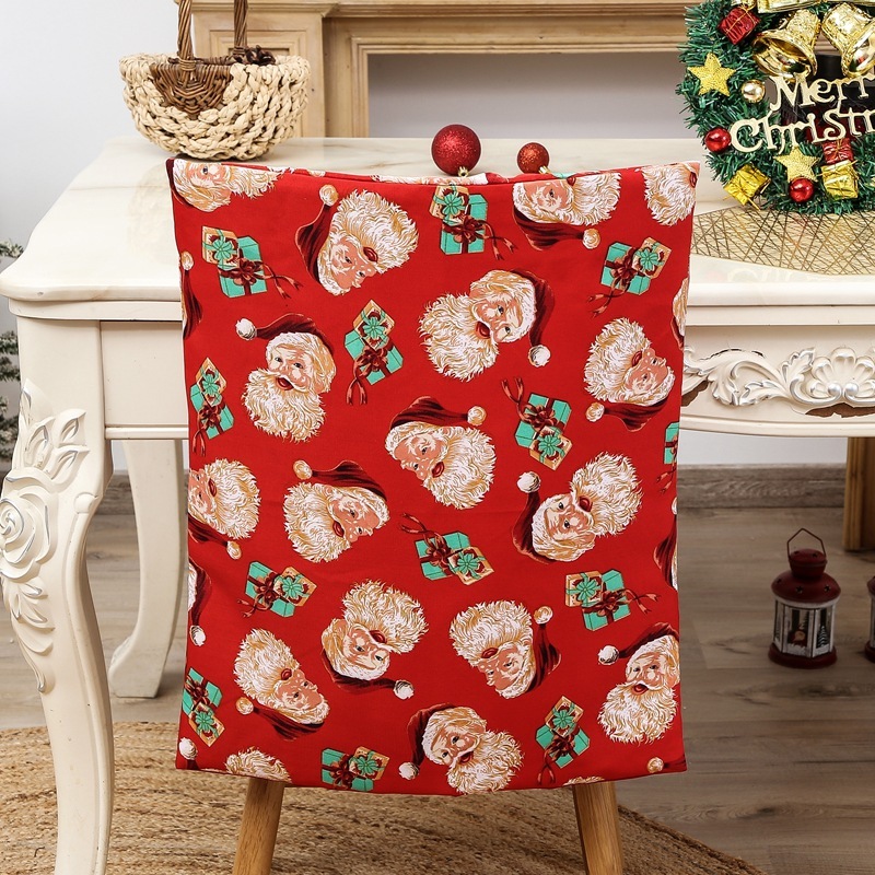 Weihnachtlicher Stuhlbezug mit Santa-Motiv