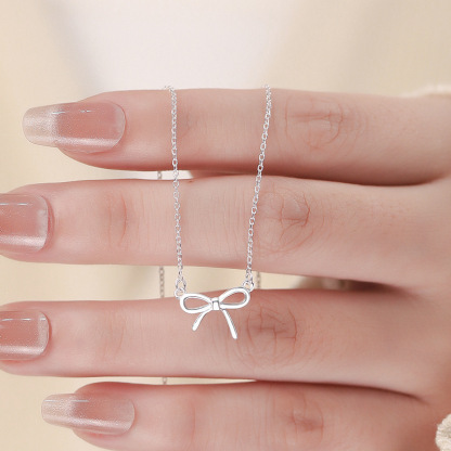 S925 Silberne Schleifen-Halskette mit Grußkarte & Box – An meine Tochter – Ein liebevolles Geschenk für Tochter