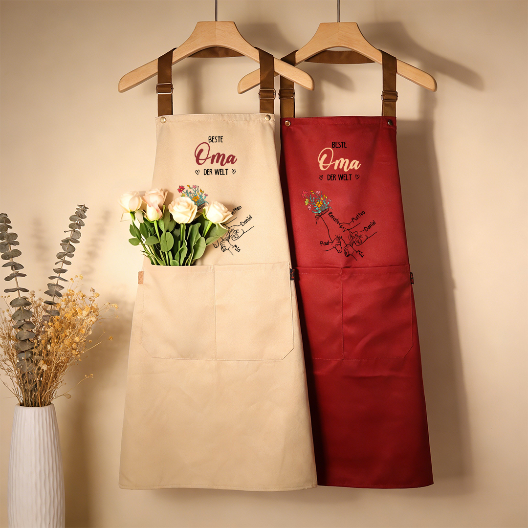 Personalisierte florale Küchenschürze mit Händchenhalten-Motiv und 2–7 Namen Geschenk für Mama oder Oma
