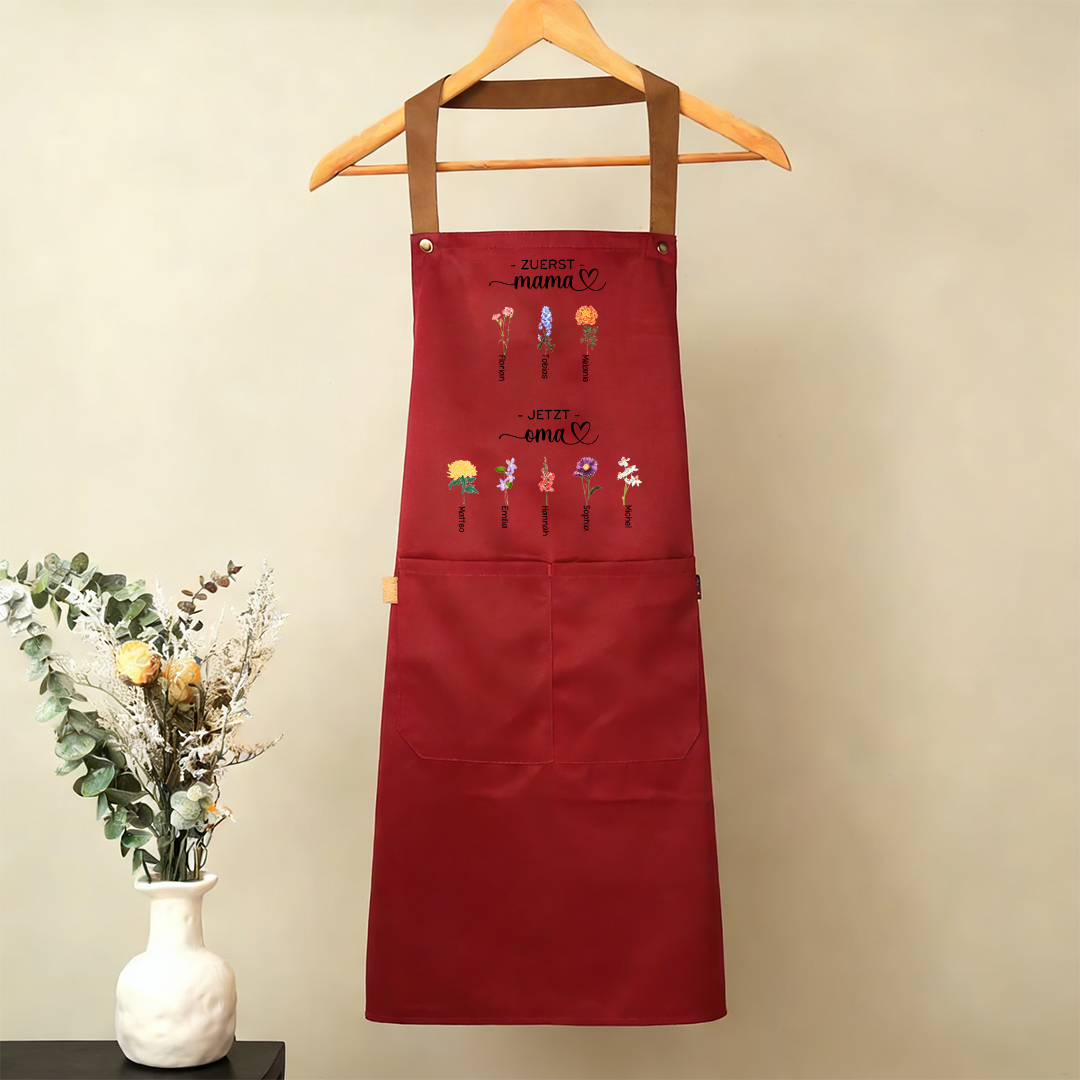 Personalisierte Schürze „Erst Mama, jetzt Oma“ mit Vornamen und Geburtsblumen