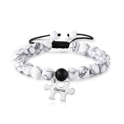 Coppia di Braccialetto con un ciondolo di puzzle cuore con 2 nomi personalizzbili