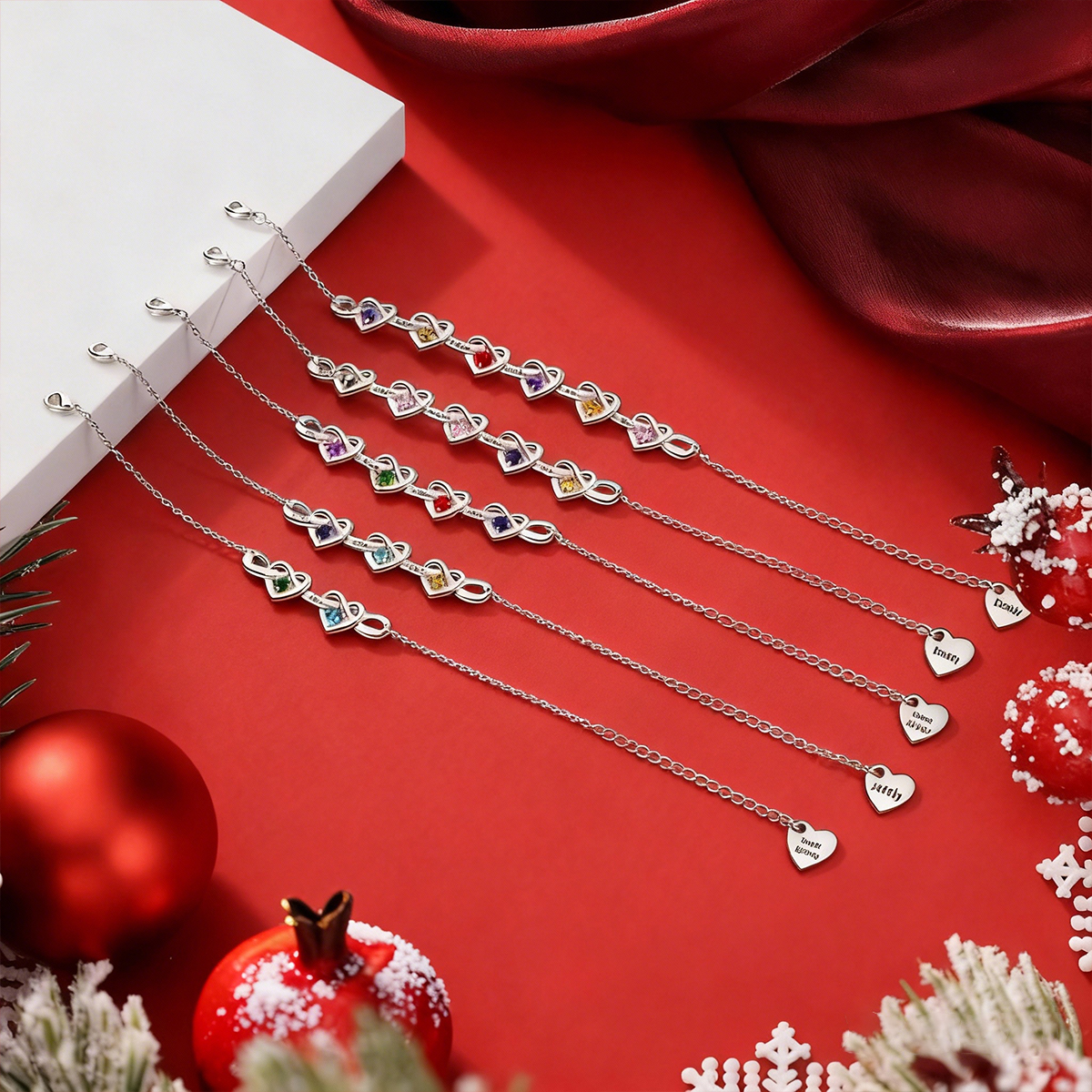 Pulsera para mujer de corazones entrelazados con 2-6 nombres y piedras personalizados color plateado | Jessemade