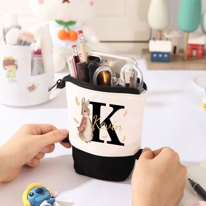 Estuche personalizado con nombre y letra con diseños coloridos para niños