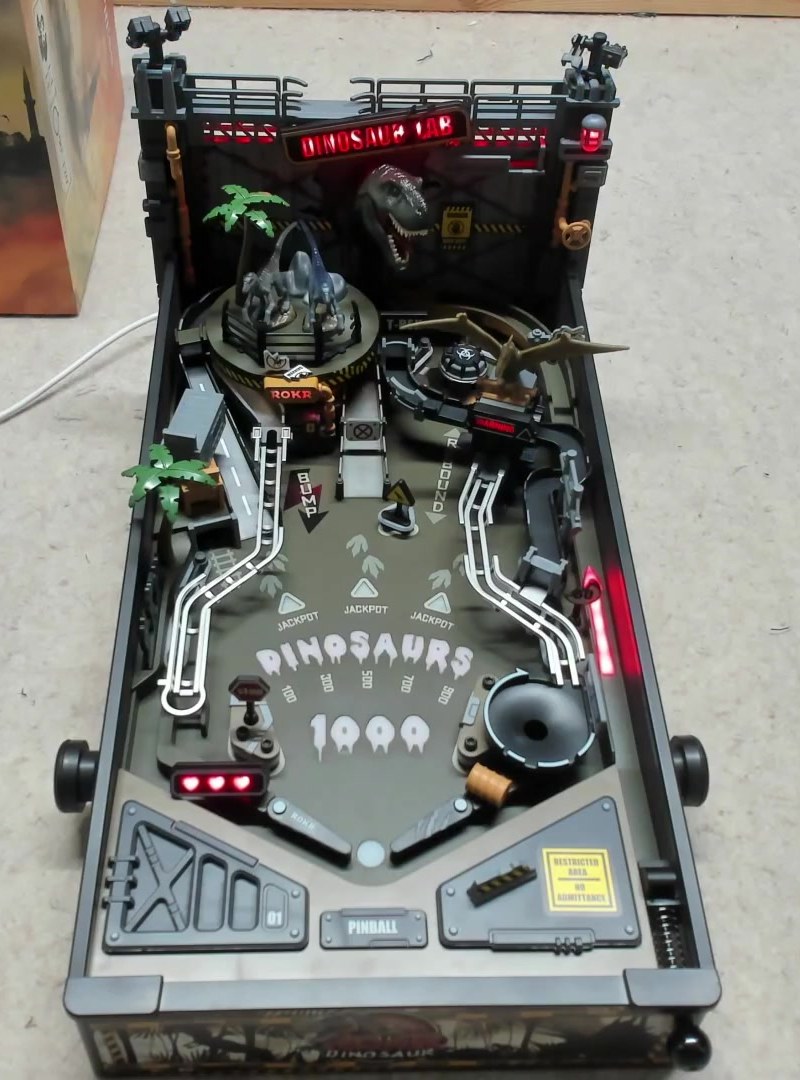 Finished ROKR Dinosaur Lab Pinball MGP01 with lit scoring panel, ramps, and backboard