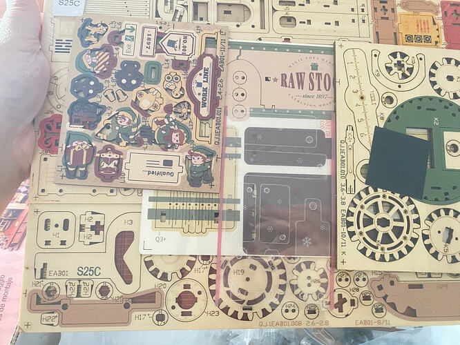 ROKR Dream Gift Factory kit parts laid out at the start of a community build journey