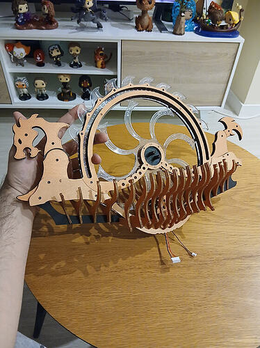 The Viking Dragon Ship being aligned with the display base and long metal rods