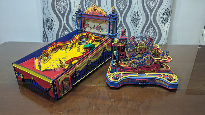 ROKR Pinball Machine displayed beside another completed family build