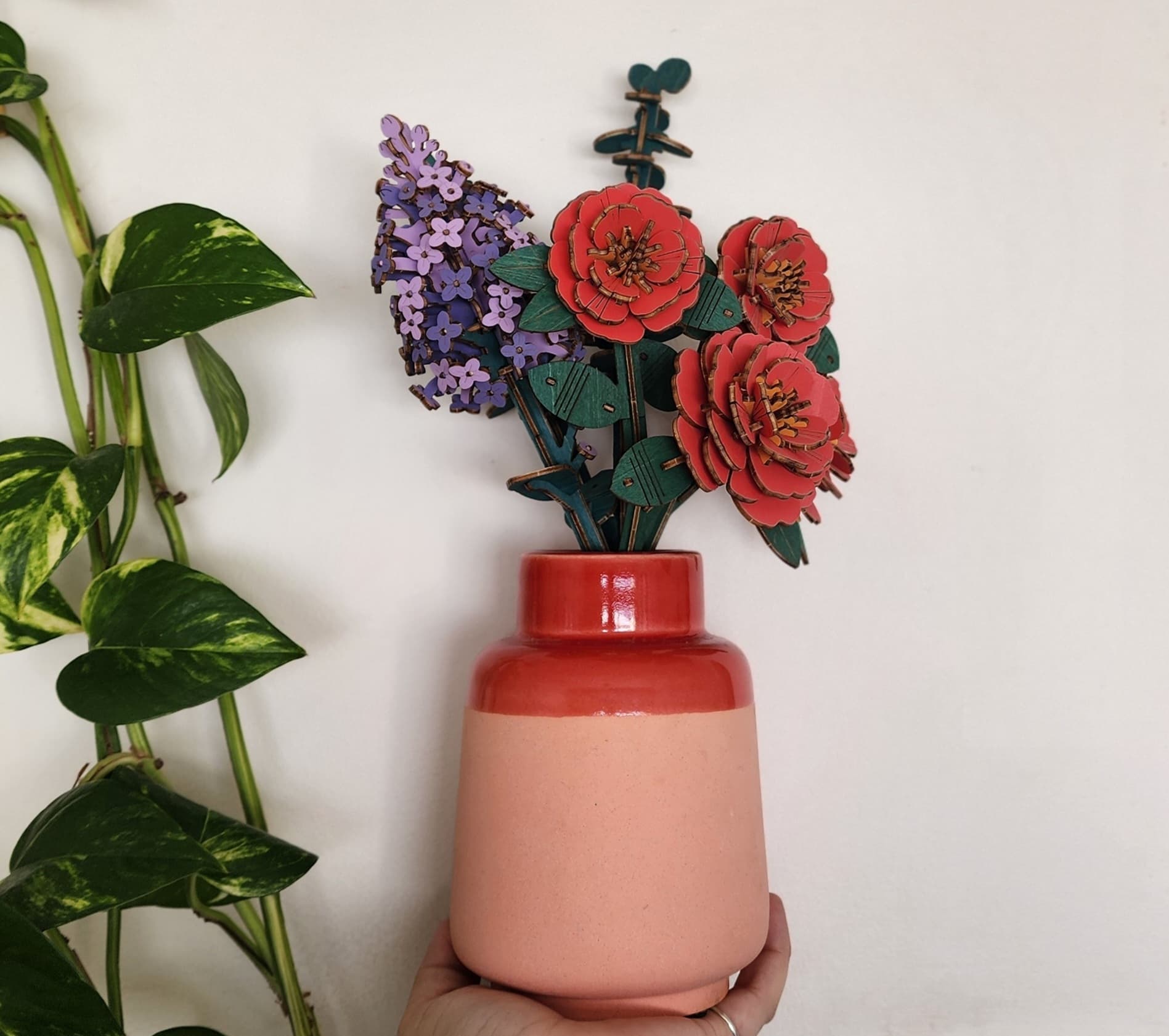 Nectarines placed ROKR's wooden flowers in a vase.