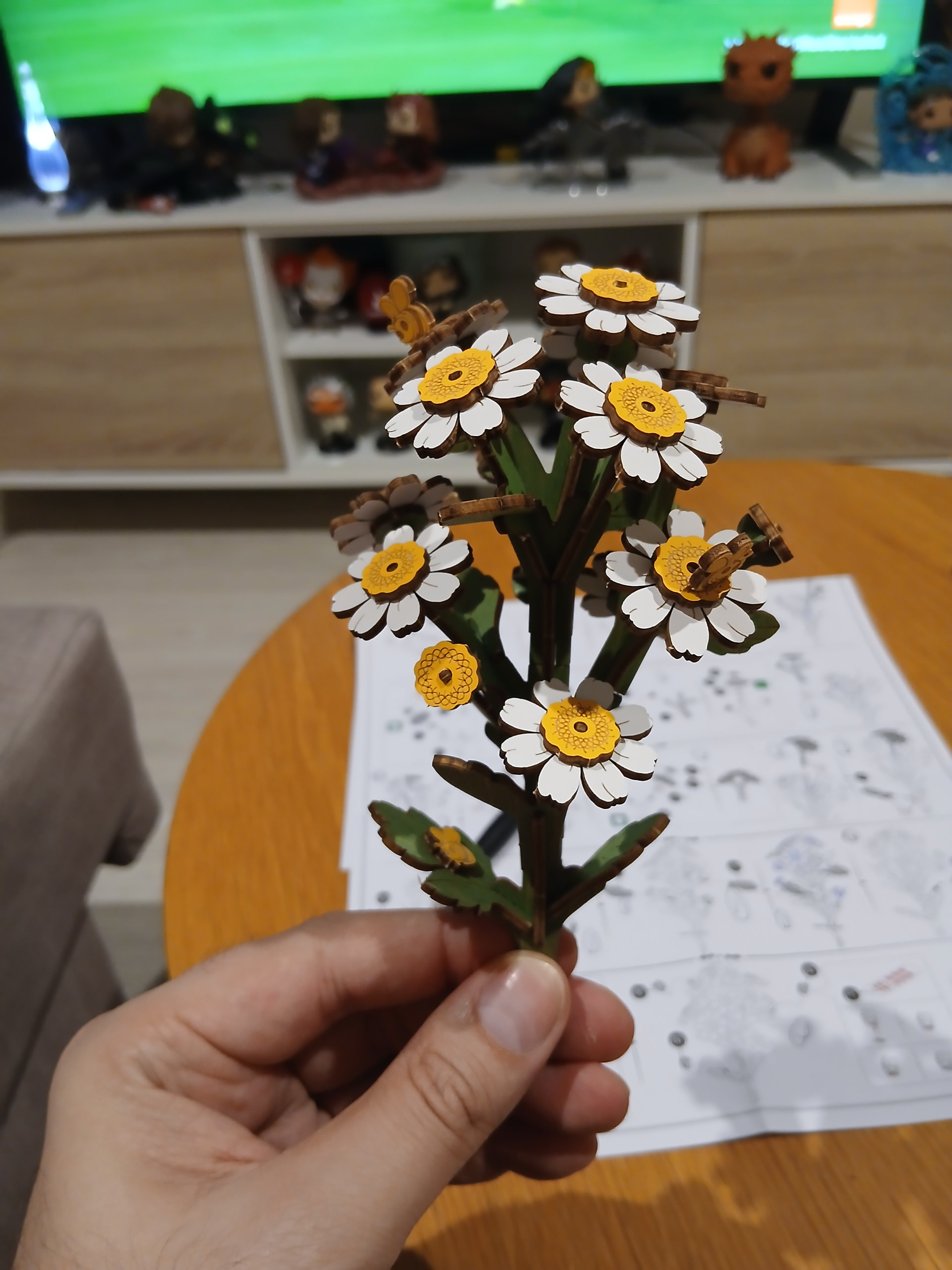 Close view of the assembled Rowood Chamomile wooden flowers before the pot is completed