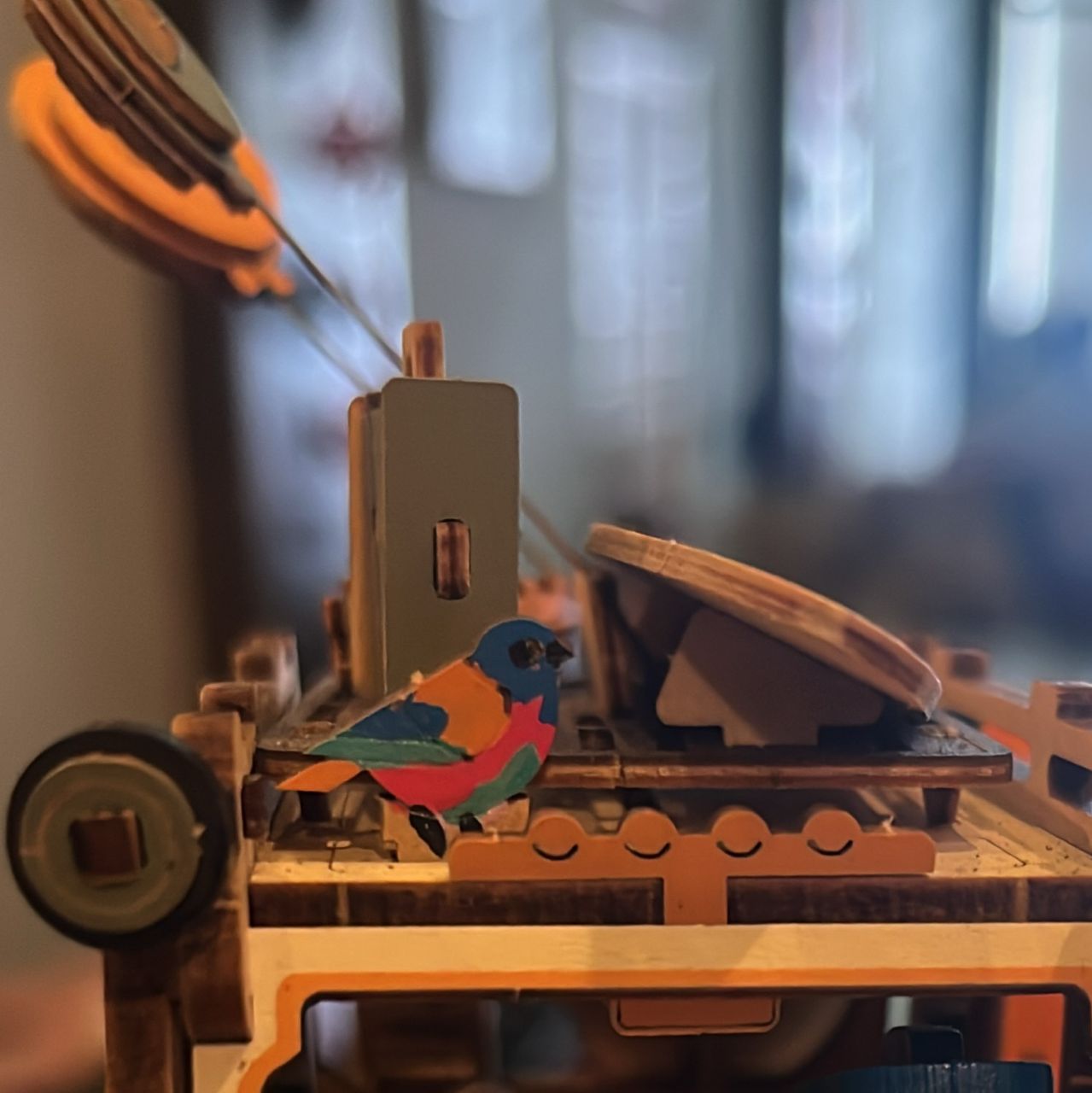 Close-up of Aiffah’s brightly painted bird customization on the Road Tripper