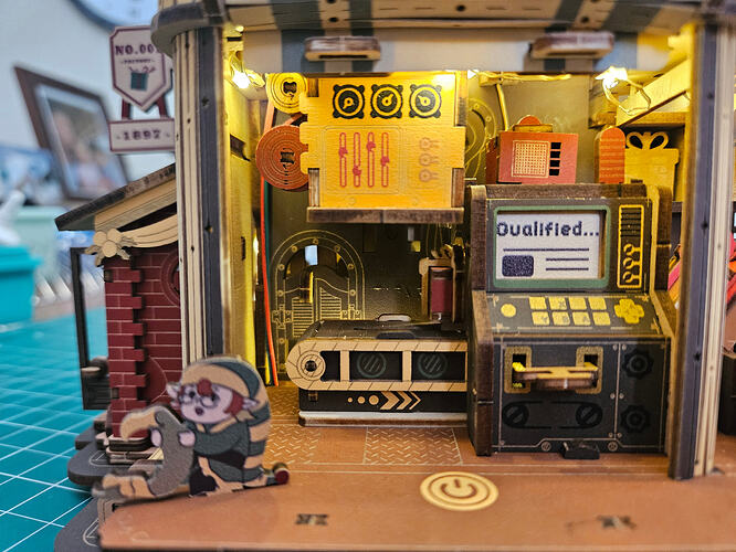 A wider angle of the finished workshop scene and moving factory layout.