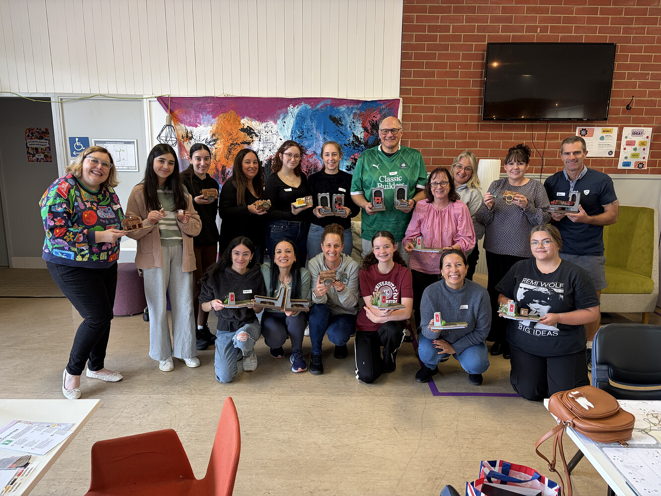 Jo_Zanella and the Queenstown meetup group posing with their DIY kits