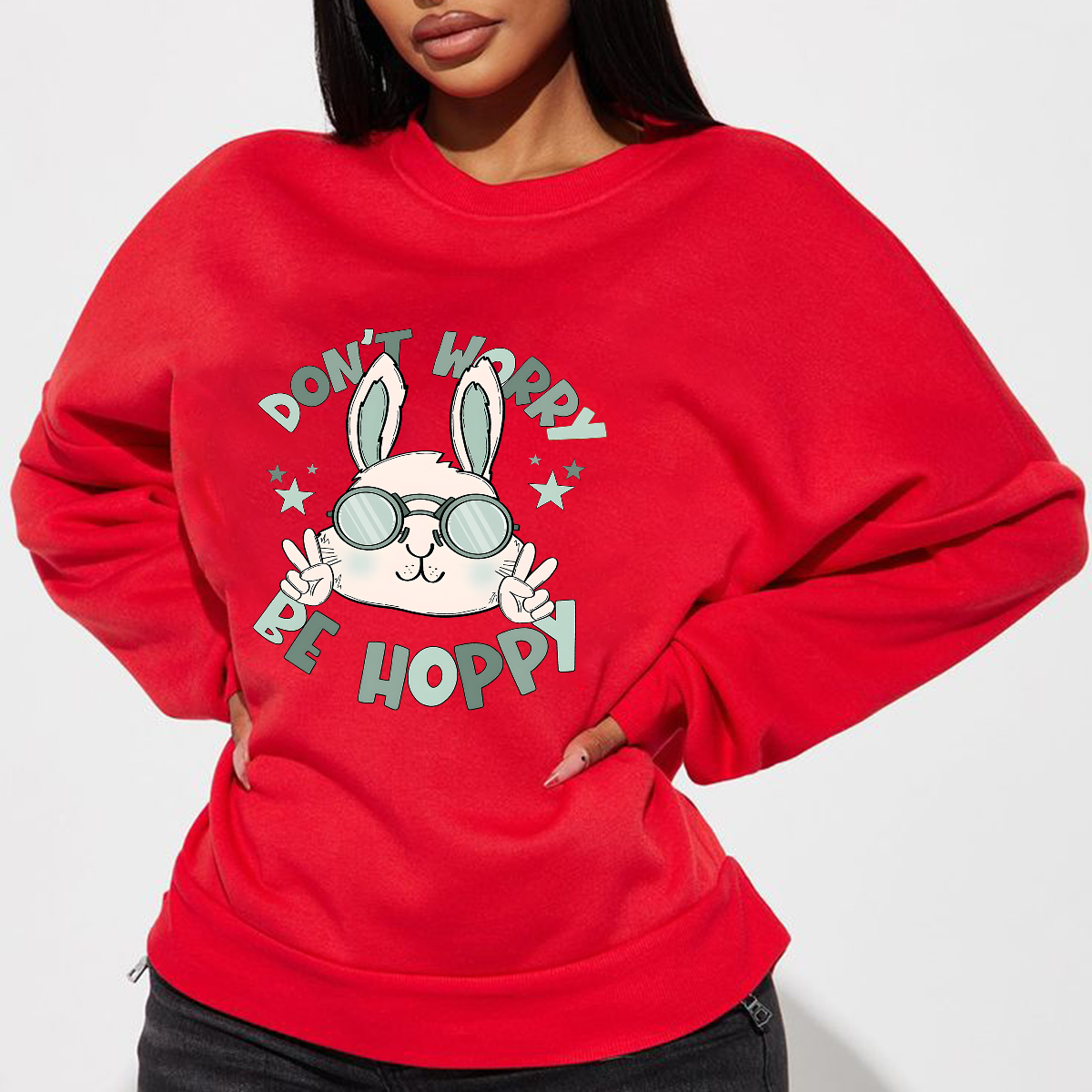 "Don'T Hoppy" Slogan And The Image Of A Rabbit Wearing Sunglasses, A Rabbit Holding Up Two Fingers And Making A "V" Sign, A Casual Sports Shirt, And A Crew Neck Sweatshirt.
