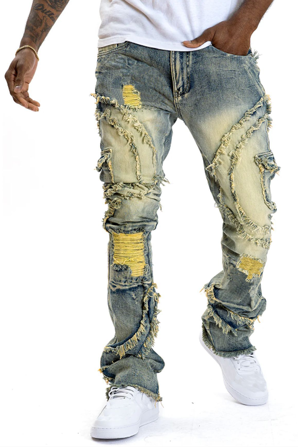 Distressed flared fringe stretch jeans