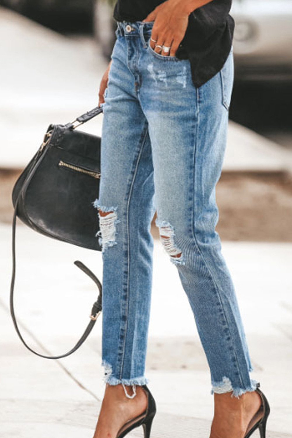 Ripped denim trousers