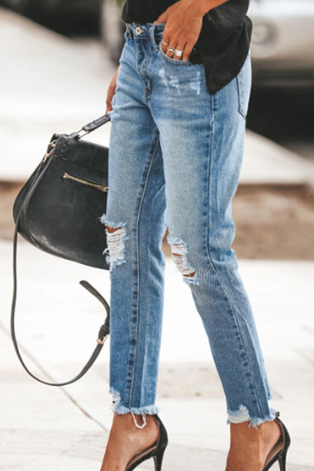 Ripped denim trousers