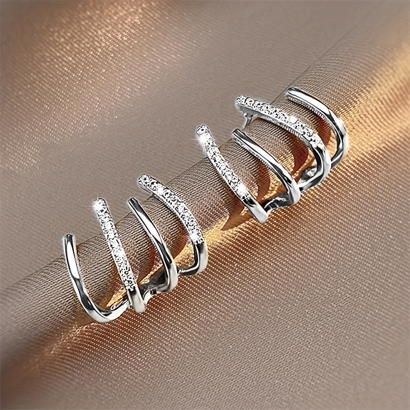 🎁 50% sleva na všechny produkty !Třpytivé, elegantní a sexy napichovací náušnice s designem ve tvaru drápů