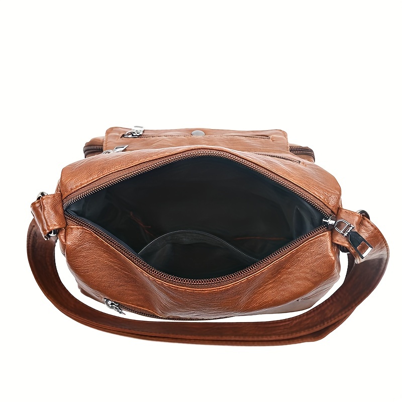 🎀Retro crossbody kabelka s více kapsami, taška přes rameno z měkké PU kůže, dámská kabelka s kovovým srdcem 💼