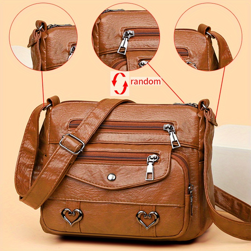 🎀Retro crossbody kabelka s více kapsami, taška přes rameno z měkké PU kůže, dámská kabelka s kovovým srdcem 💼