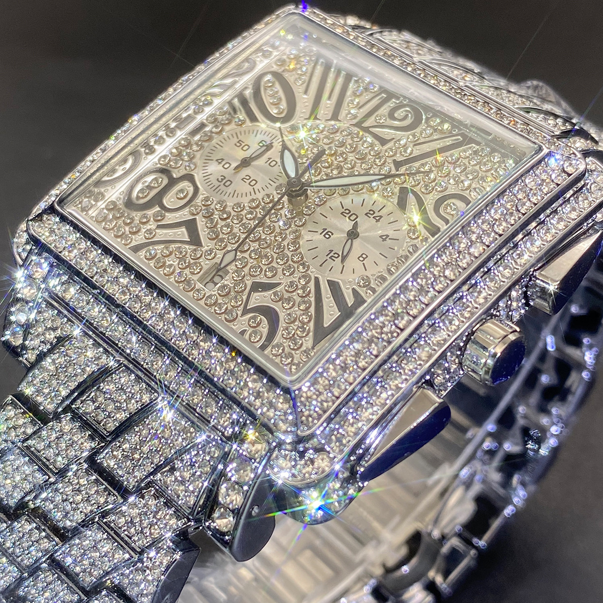 Moissanite watch with a square case stylized numerals.