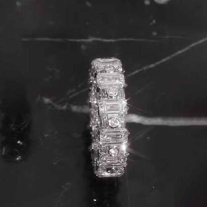 Moissanite Emerald Symmetry Round Luxury Ring