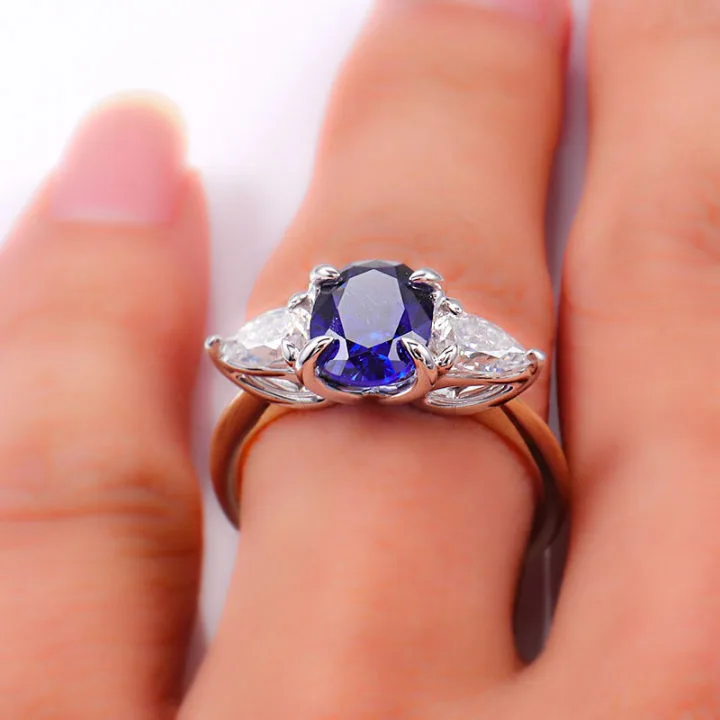 Three Stones Oval Sapphire Engagement Ring with Pear Moissanite