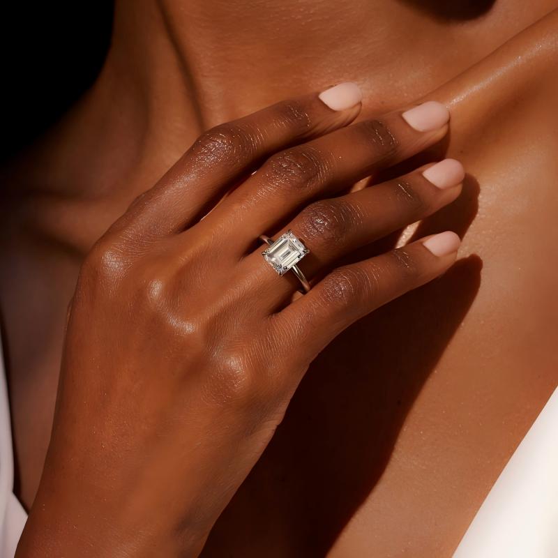 Classic Four-Prong Emerald Moissanite Ring