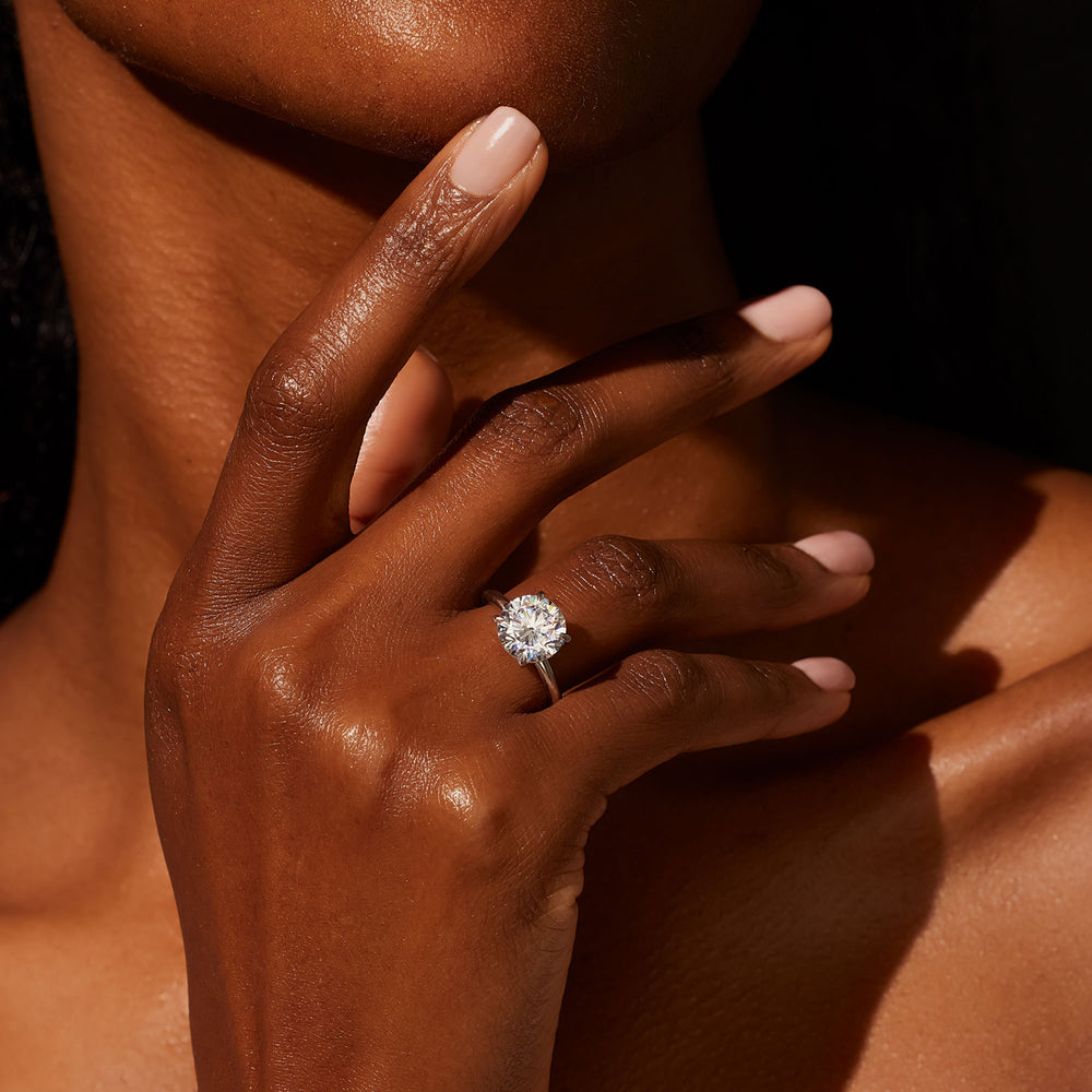 Classic Four-Prong Round Moissanite Ring