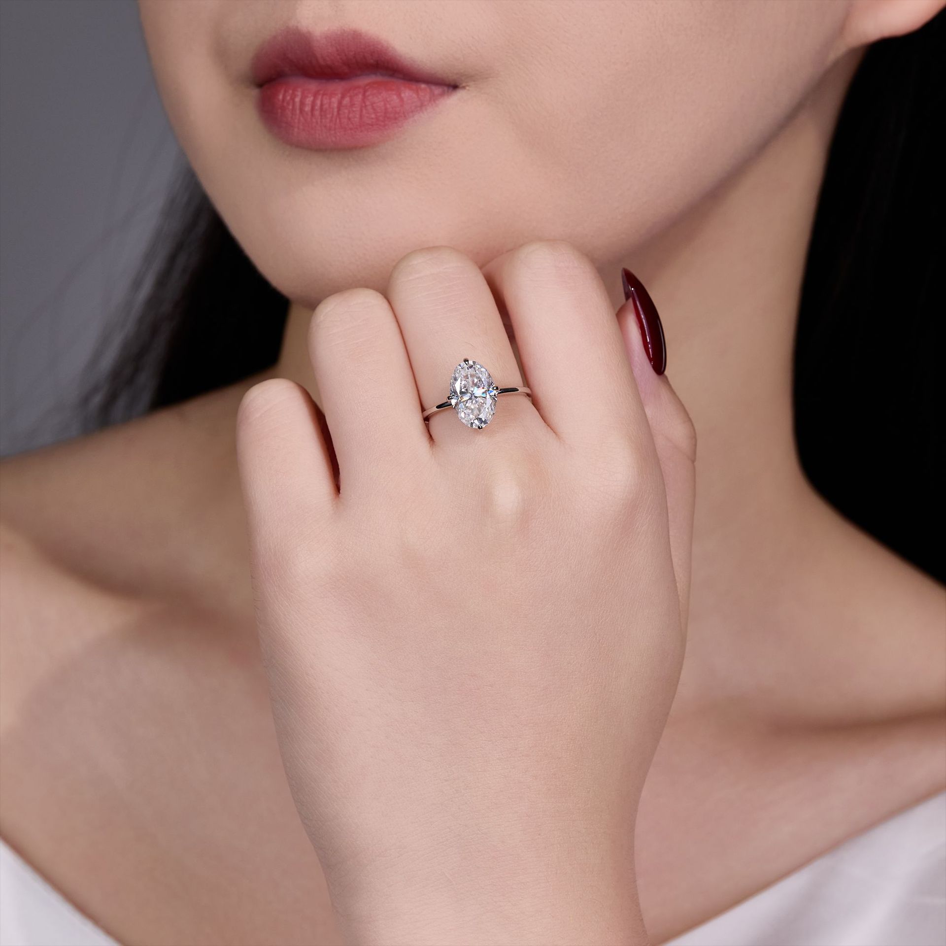 Classic Four-Prong Oval Moissanite Ring