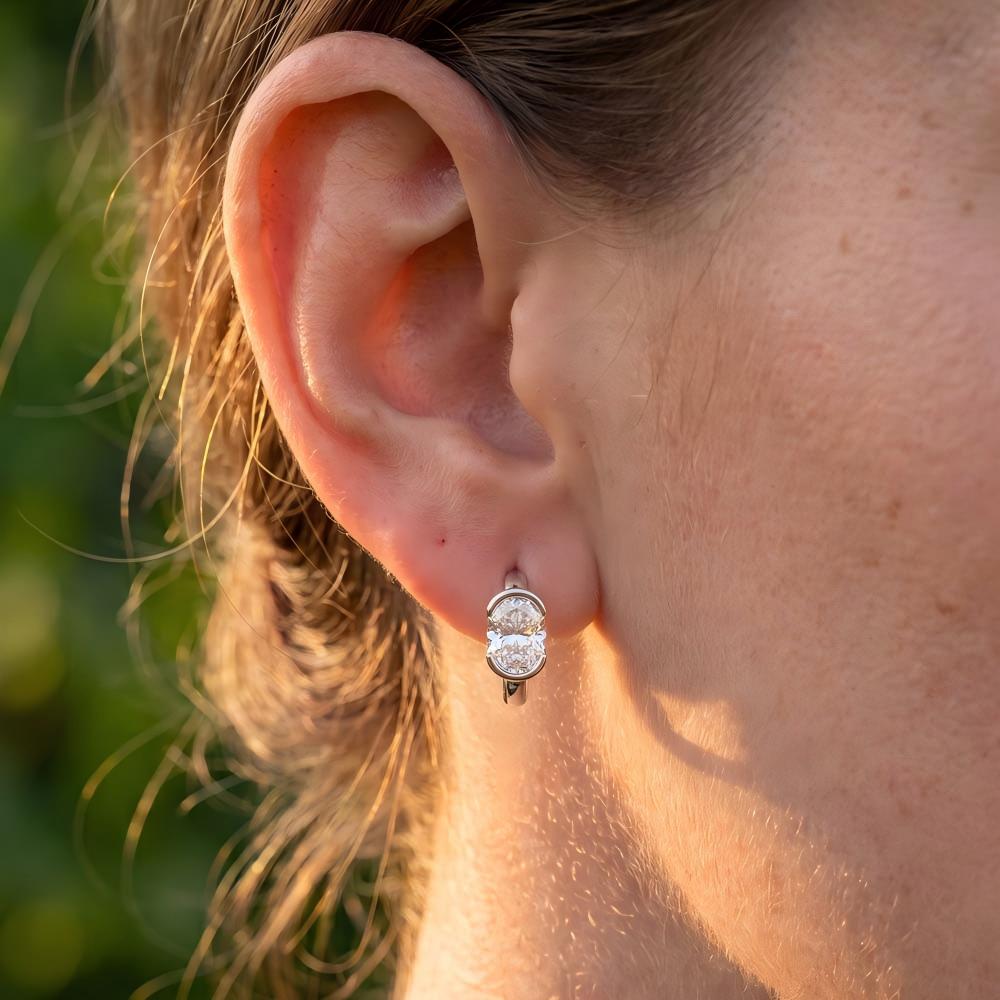 Half Bezel Oval Moissanite Hoop Earrings