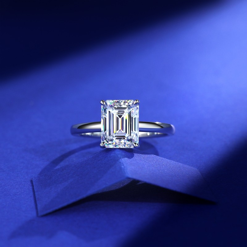 Classic Four-Prong Emerald Moissanite Ring