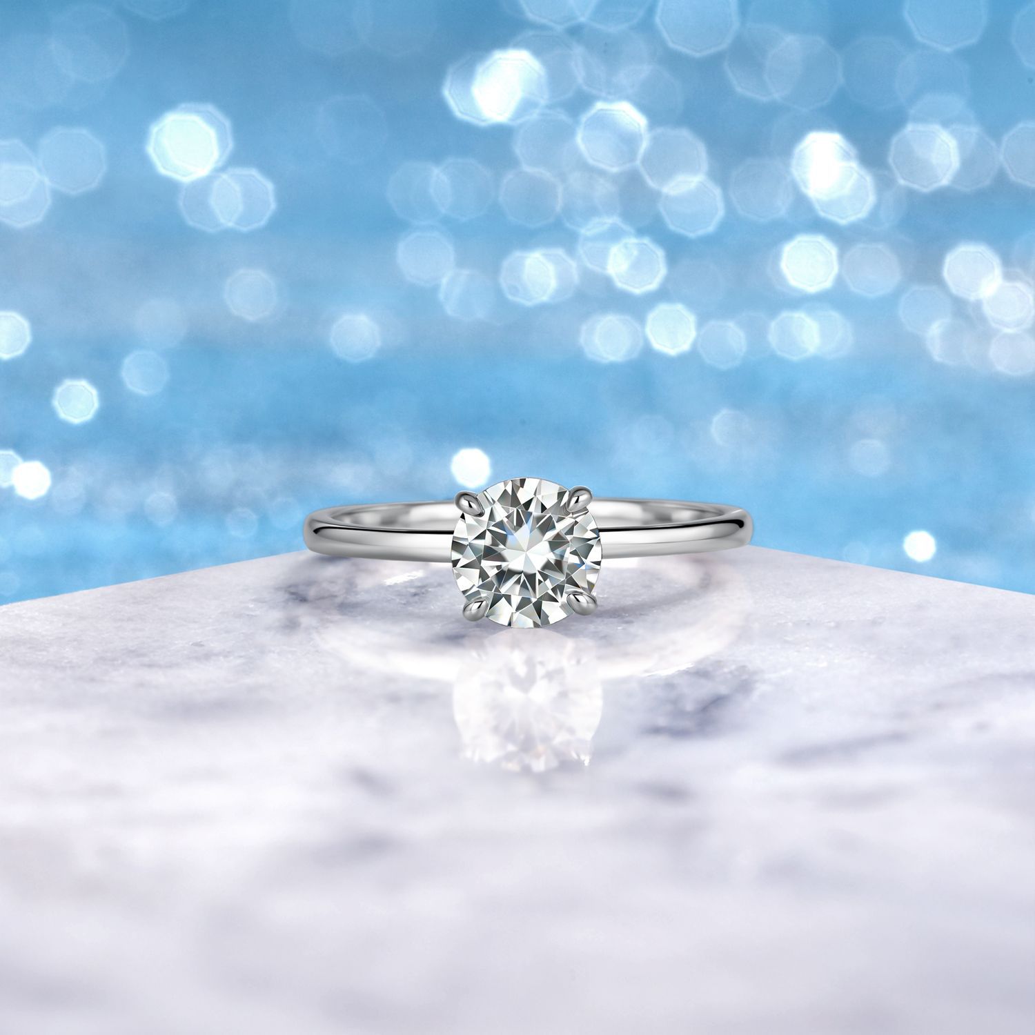 Classic Four-Prong Round Moissanite Ring