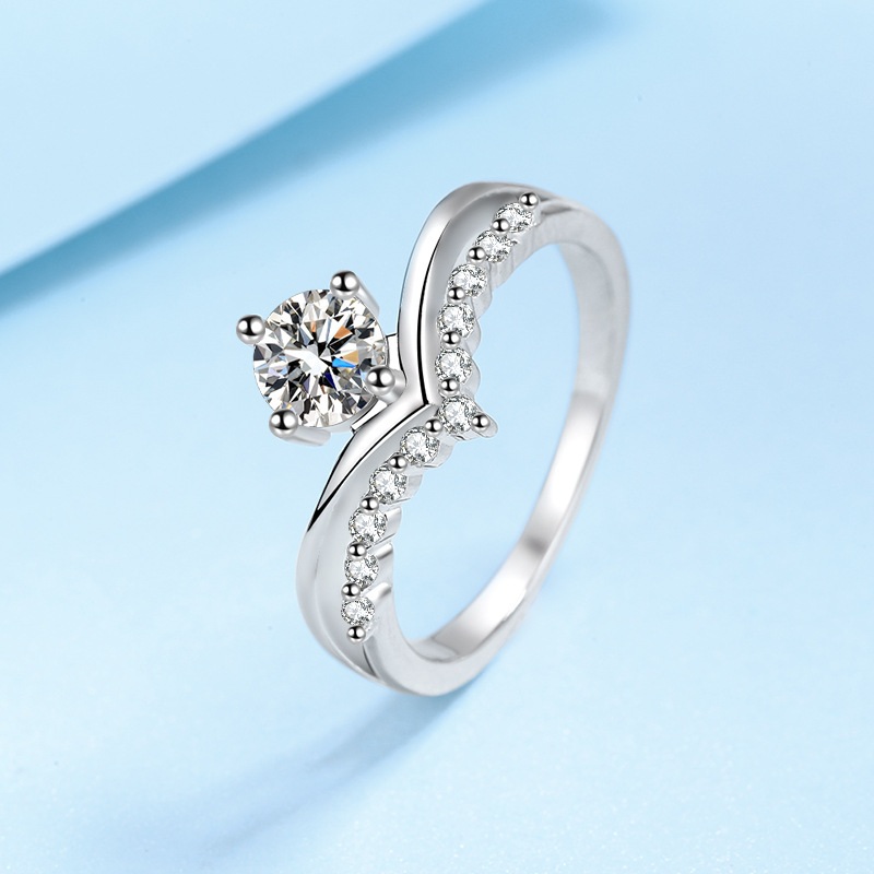Leila Round Moissanite Engagement Ring
